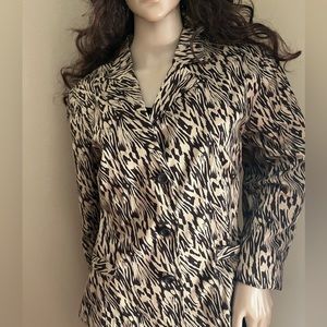 Nice polished cotton animal print brown and tan jacket.  Size 14 Button front